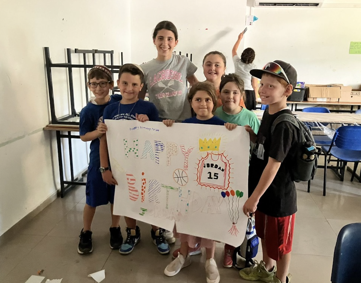 Sophomore Yarden Wilkenfeld working with her campers at at All Star Israel Sports camp this summer. Photo used with permission from Wilkenfeld.